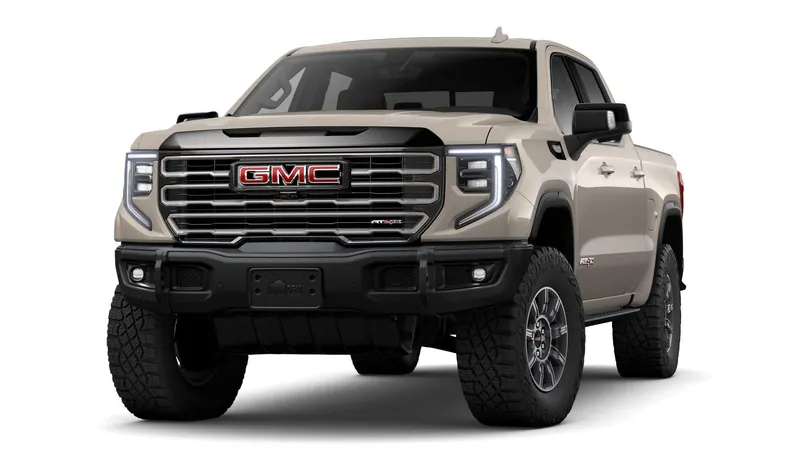 2026 GMC Sierra 1500 AT4X in Coastal Dune — front three-quarter view