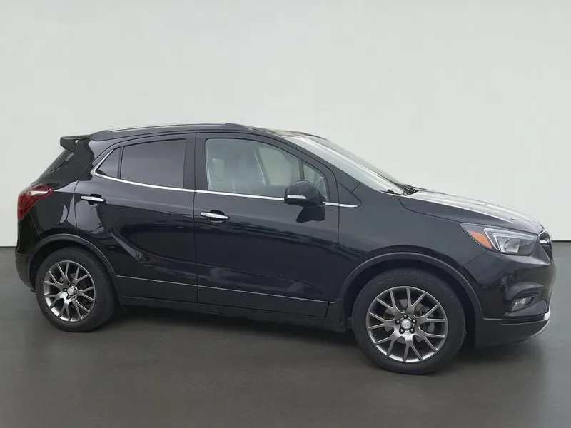 2019 Buick Encore Sport Touring in Ebony Twilight Metallic — front three-quarter view
