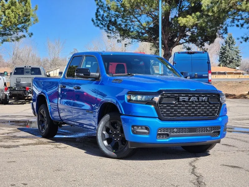 2026 RAM 1500 RAM 1500 BIG HORN QUAD CAB 4X4 6'4' BOX in Hydro Blue Pearl-Coat Exterior Paint — front three-quarter view