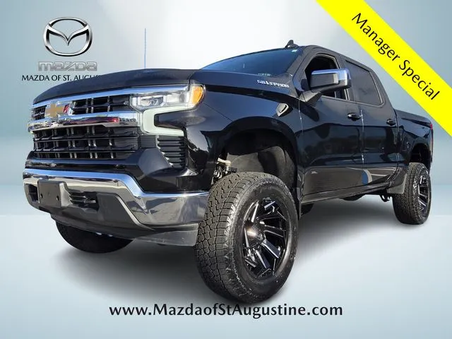 2025 Chevrolet Silverado 1500 LT in Black — front three-quarter view