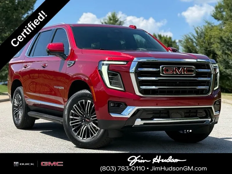 2026 GMC Yukon Elevation in Volcanic Red — front three-quarter view
