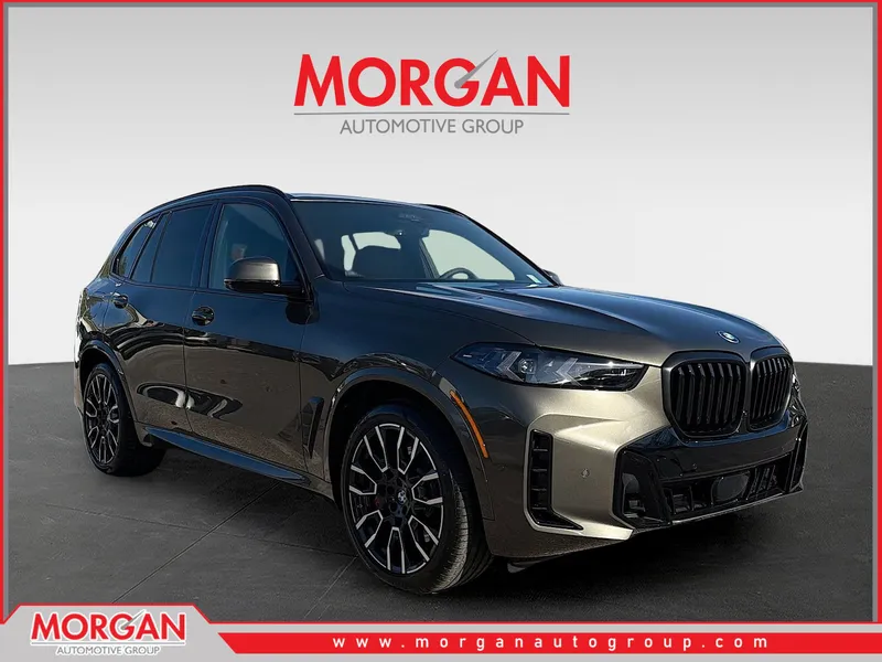 2026 BMW X5 xDrive50e in Manhattan Green Metallic — front three-quarter view