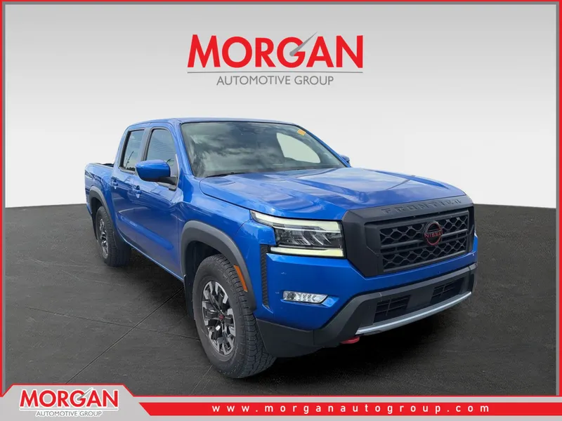 2024 Nissan Frontier PRO-X in Blue — front three-quarter view