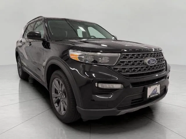 2024 Ford Explorer XLT 4WD in Agate Black Metallic — front three-quarter view