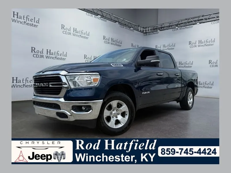 2019 RAM 1500 Big Horn/Lone Star Crew Cab 4x4 5'7' Box in Patriot Blue Pearlcoat — front three-quarter view