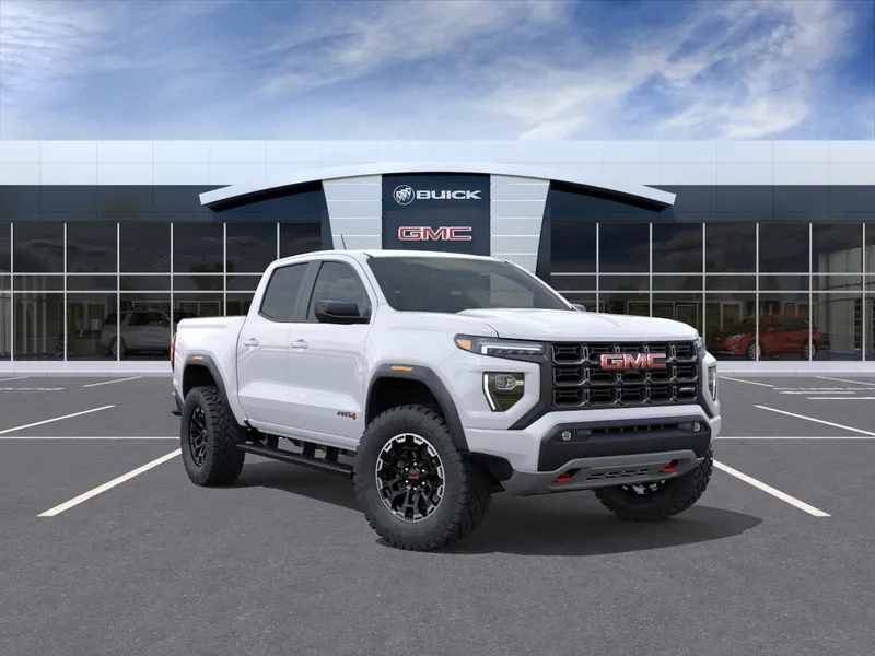 2026 GMC Canyon AT4 in Summit White — front three-quarter view