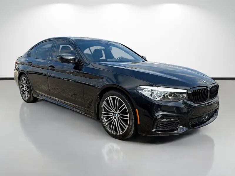 2020 BMW 5 Series 540i xDrive in Black — front three-quarter view