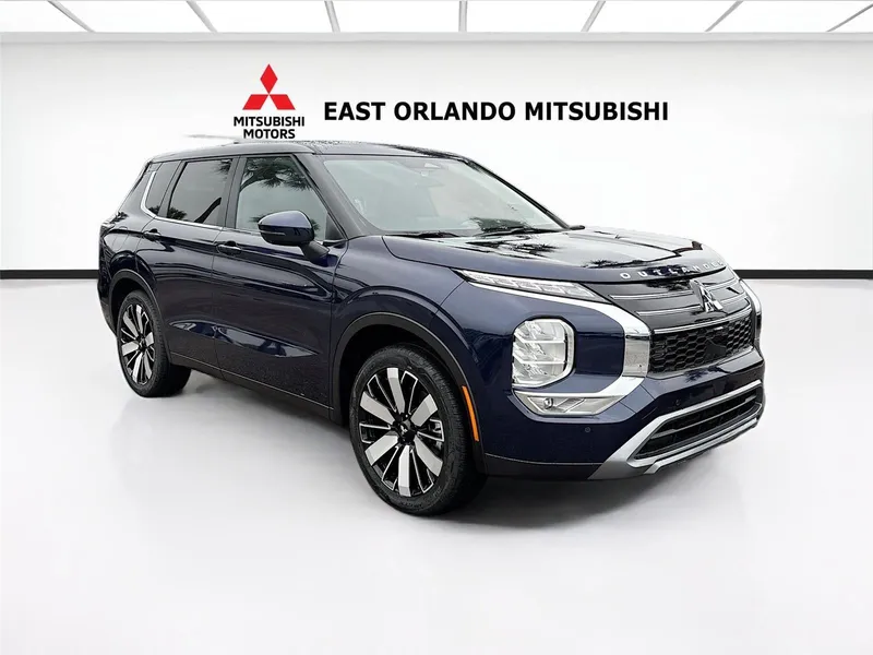 2026 Mitsubishi Outlander SE in Cosmic Blue Metallic — front three-quarter view