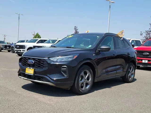 2024 Ford Escape ST-Line in Black Metallic — front three-quarter view