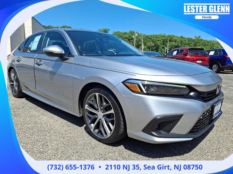 2023 Honda Civic Touring in Lunar Silver Metallic — front three-quarter view