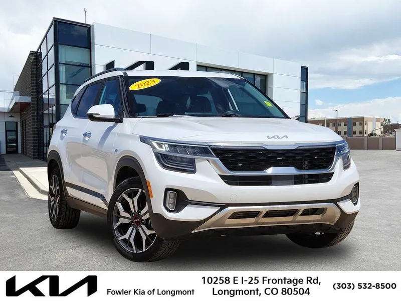 2023 Kia Seltos SX in Snow White Pearl — front three-quarter view