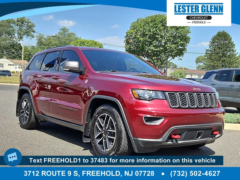 2021 Jeep Grand Cherokee Trailhawk 4x4 in Red — front three-quarter view