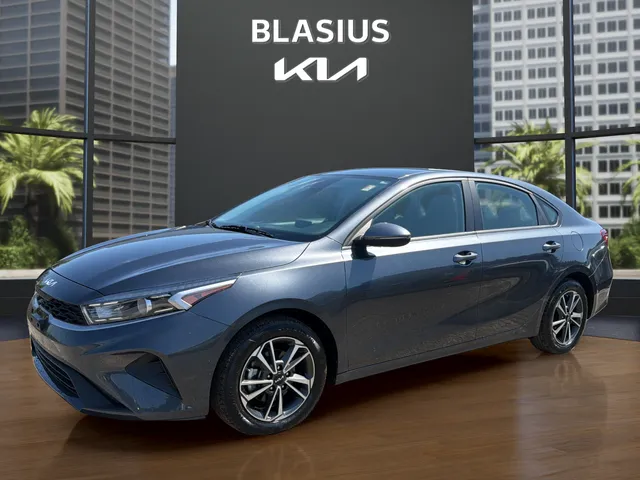 2024 Kia Forte LXS in Gravity Gray — front three-quarter view