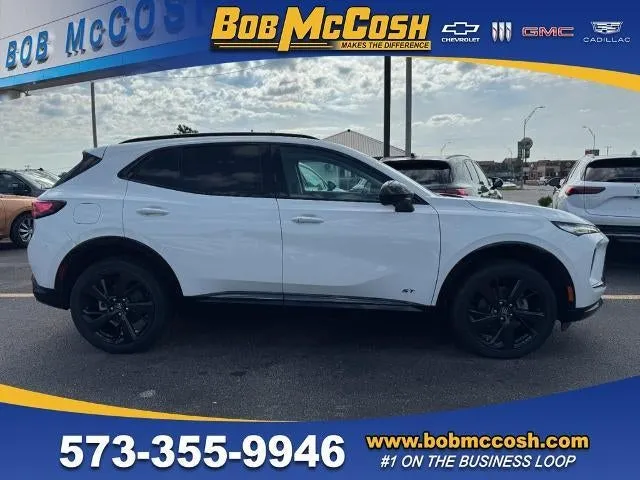 2026 Buick Envision Sport Touring in Summit White — front three-quarter view