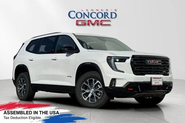 2026 GMC Acadia AT4 in Summit White — front three-quarter view