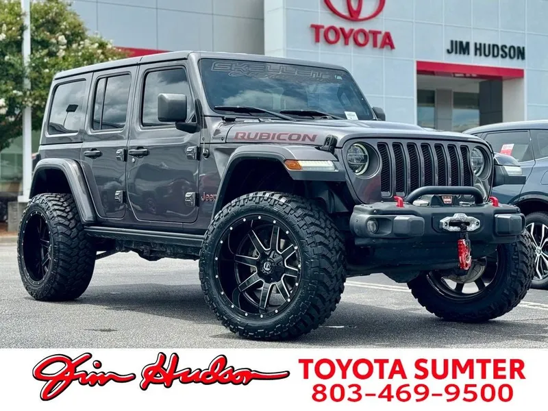 2021 Jeep Wrangler Unlimited Rubicon in Crystal Metallic — front three-quarter view