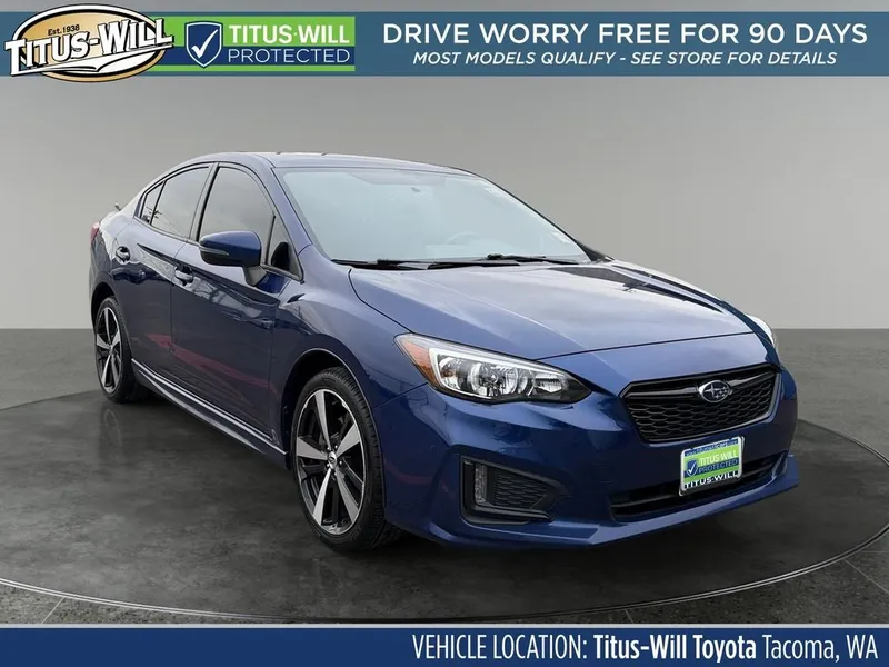 2017 Subaru Impreza 2.0i Sport in Lapis Blue Pearl — front three-quarter view
