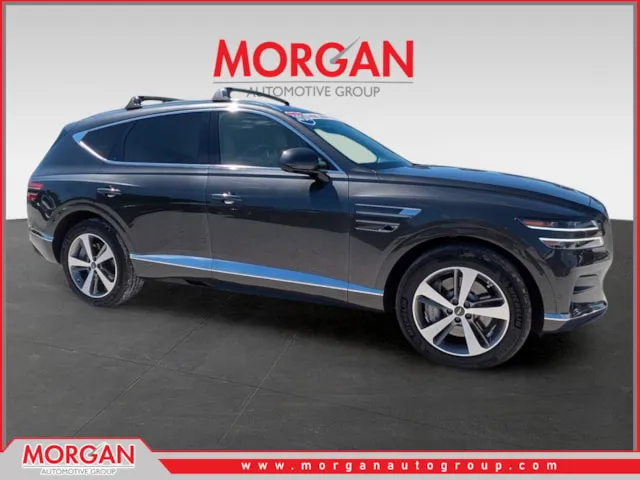 2024 Genesis GV80 3.5T in Makalu Gray — front three-quarter view