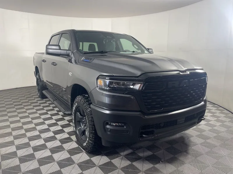 2026 RAM 1500 RAM 1500 WARLOCK CREW CAB 4X4 5'7' BOX in Granite Crystal Metallic Clear-Coat Exterior Paint — front three-quarter view