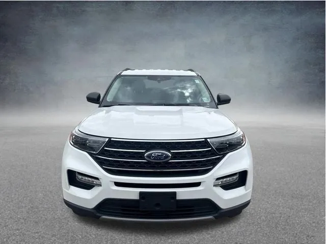 2023 Ford Explorer XLT in White Metallic — front three-quarter view