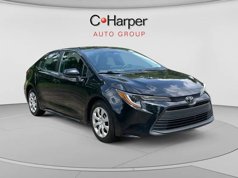 2024 Toyota Corolla LE in Black — front three-quarter view