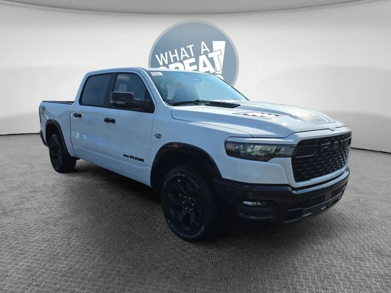 2026 RAM 1500 Big Horn/Lone Star in Bright White Clearcoat — front three-quarter view