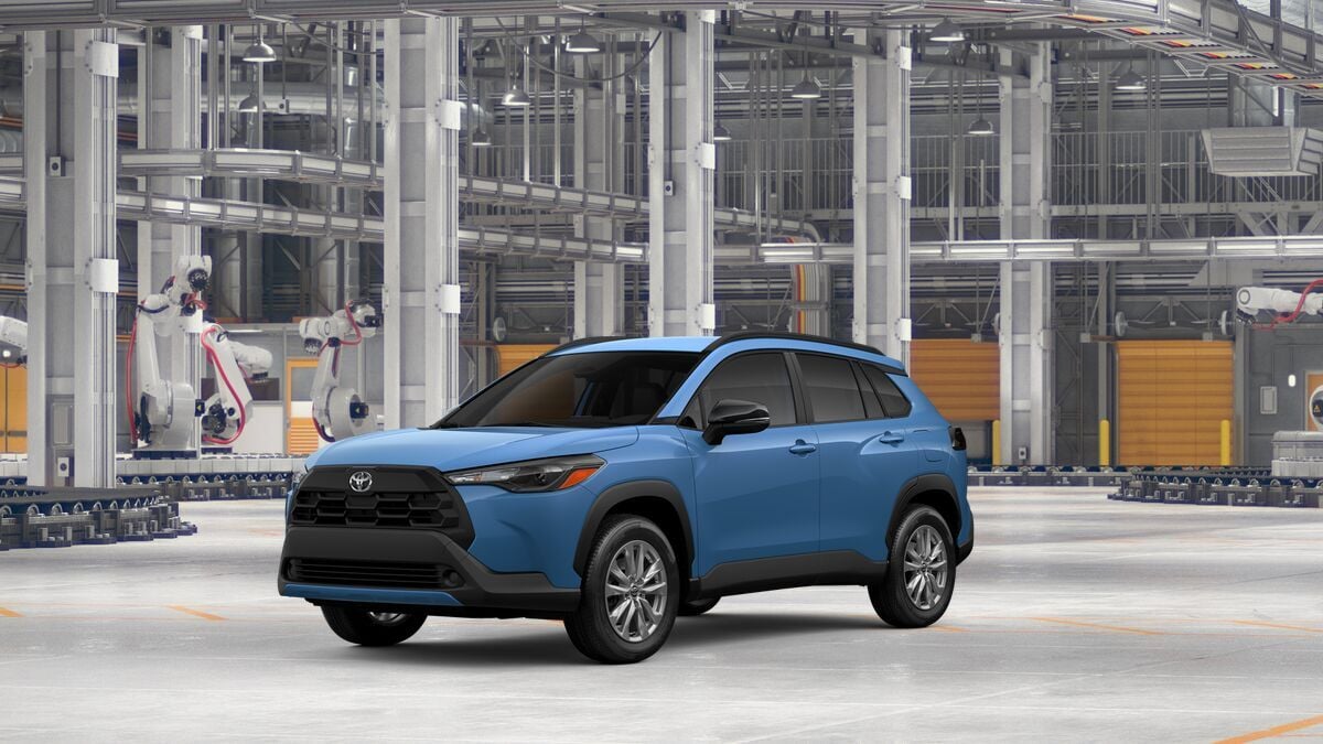 2026 Toyota Corolla Cross LE in Cavalry Blue — front three-quarter view