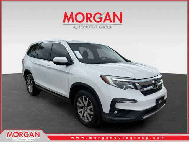 2021 Honda Pilot EX-L in White — front three-quarter view
