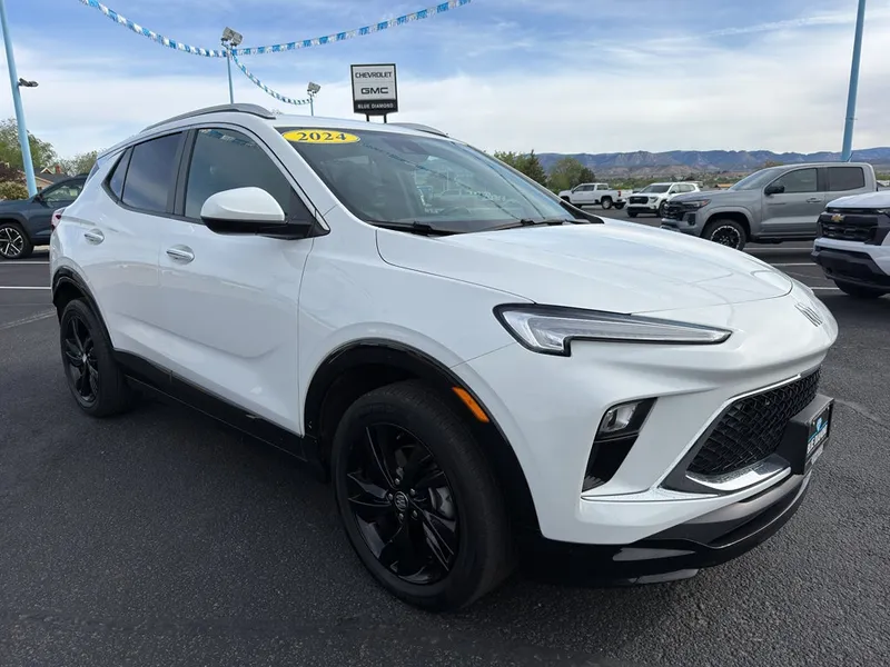 2024 Buick Encore GX Sport Touring in Summit White — front three-quarter view