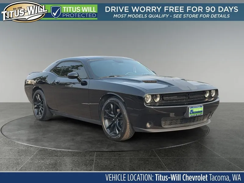 2016 Dodge Challenger SXT in Black — front three-quarter view