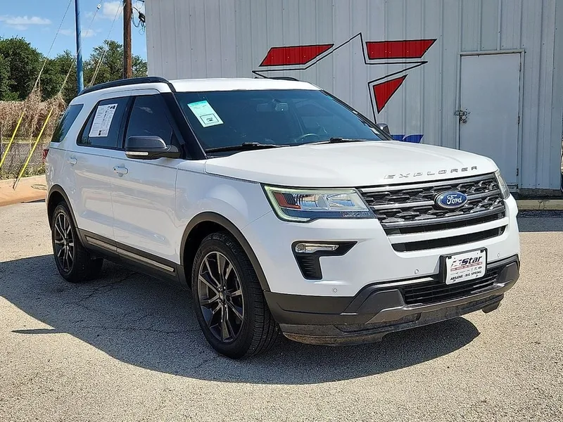 2019 Ford Explorer XLT in Oxford White — front three-quarter view