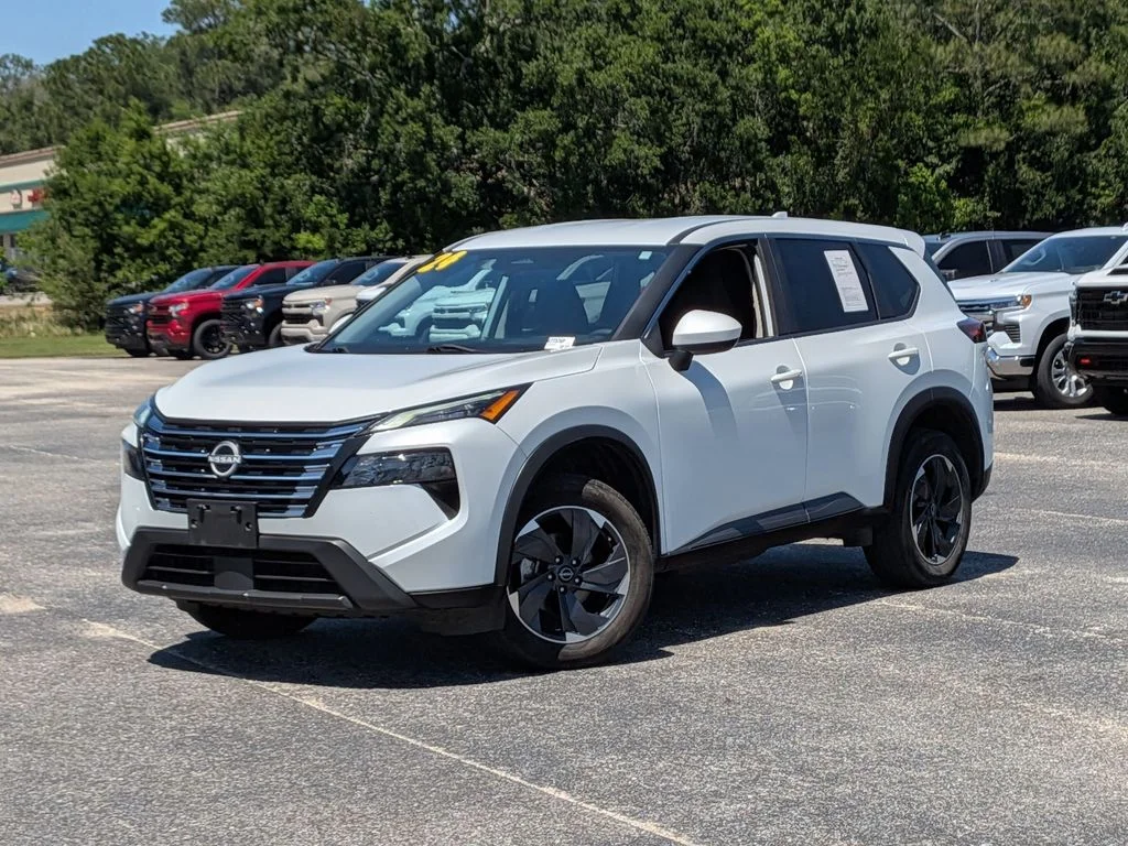 2024 Nissan Rogue SV in White — front three-quarter view