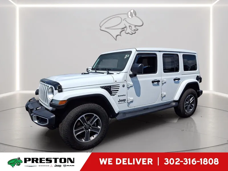 2023 Jeep Wrangler Sahara in Bright White Clearcoat — front three-quarter view