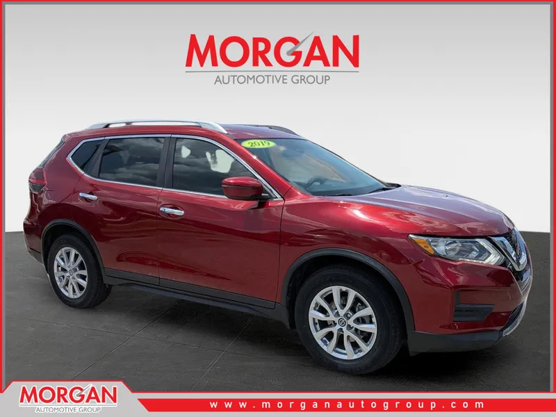 2019 Nissan Rogue SV in Scarlet Ember Tintcoat — front three-quarter view