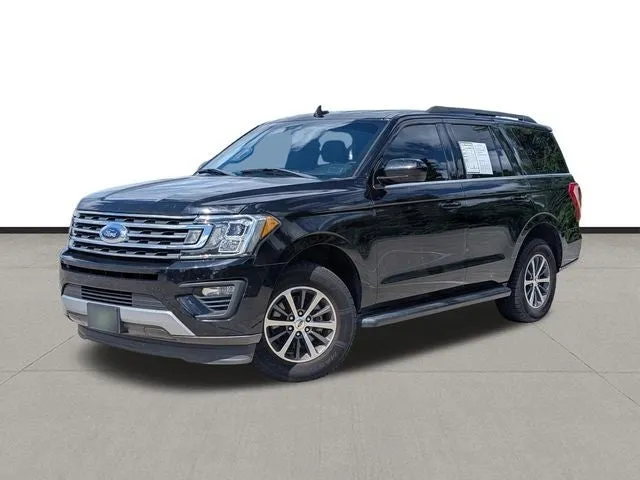 2021 Ford Expedition XLT in Black Metallic — front three-quarter view