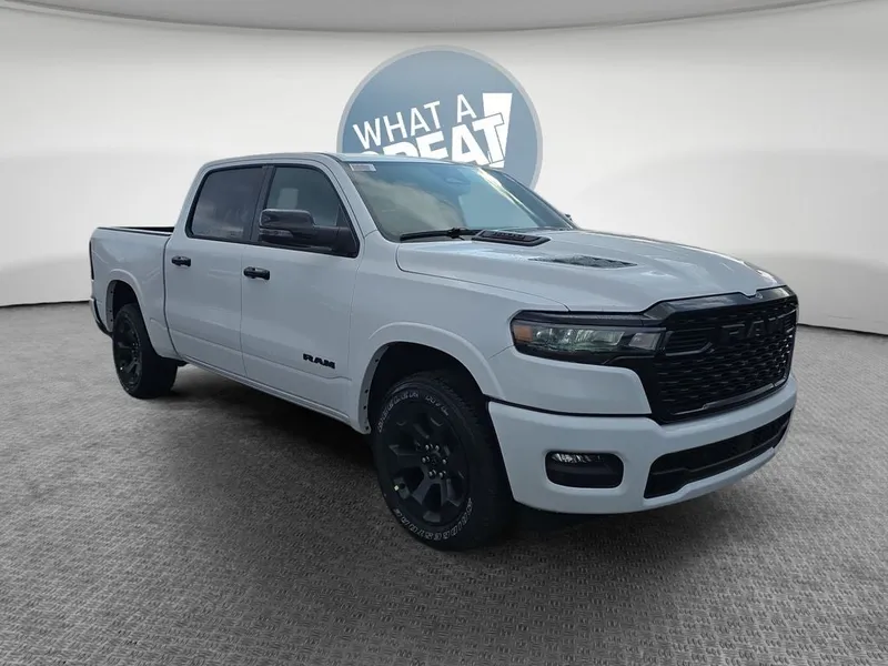 2026 RAM 1500 Big Horn/Lone Star in Bright White Clearcoat — front three-quarter view
