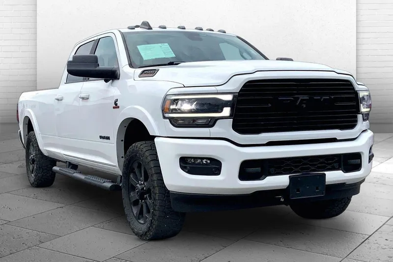 2021 RAM 3500 Laramie Crew Cab 4x4 8' Box in Bright White Clearcoat — front three-quarter view