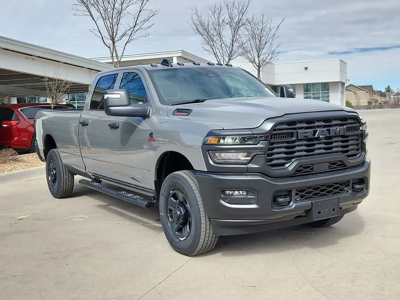 2026 RAM 3500 RAM 3500 TRADESMAN CREW CAB 4X4 8' BOX in Ceramic Gray Clear-Coat Exterior Paint — front three-quarter view