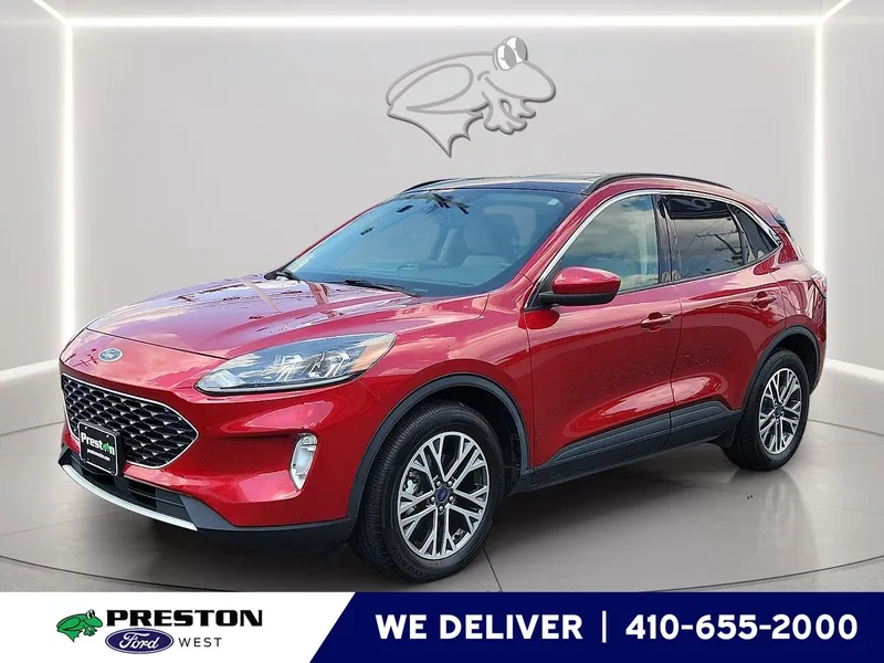 2020 Ford Escape SEL in Rapid Red Metallic Tinted Clearcoat — front three-quarter view