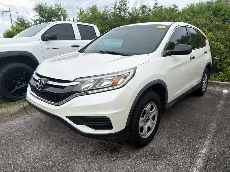 2016 Honda CR-V LX in White Diamond Pearl — front three-quarter view
