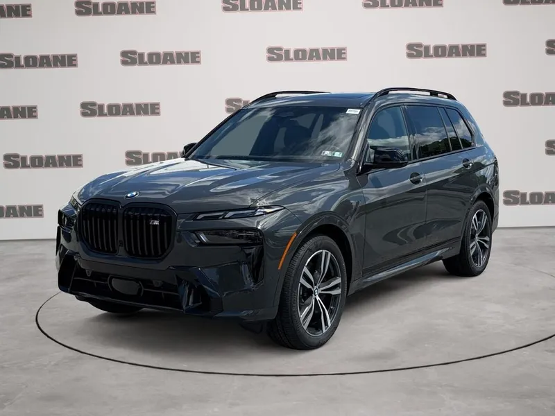 2027 BMW X7 M60i in Dravit Grey Metallic — front three-quarter view