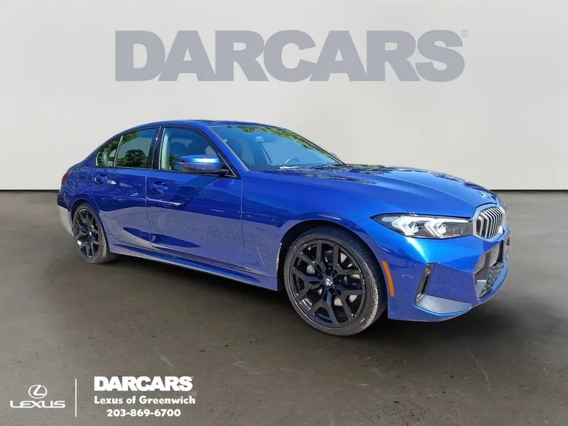 2026 BMW 3 Series 330i xDrive in Portimao Blue Metallic — front three-quarter view