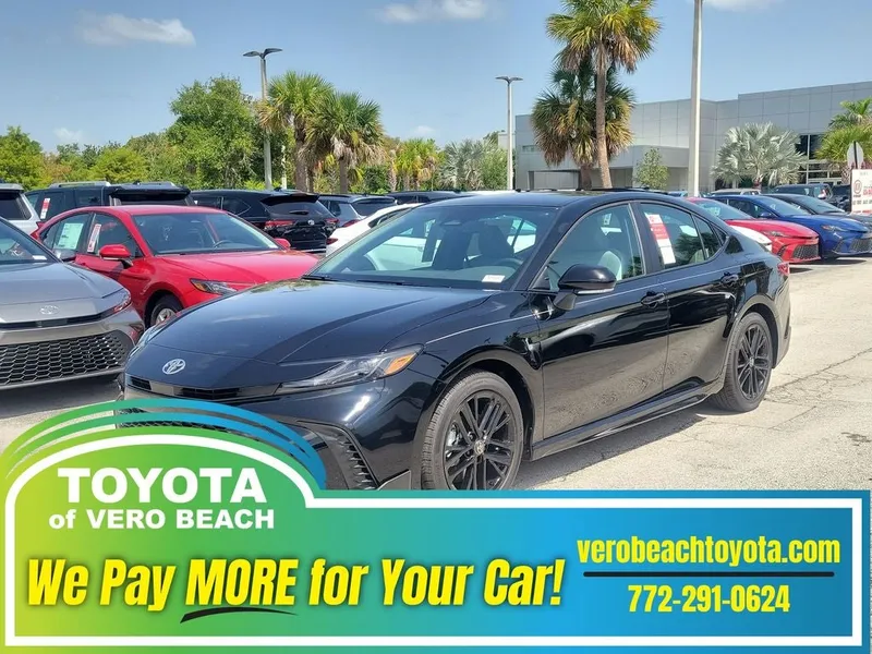 2026 Toyota Camry SE in Midnight Black Metallic — front three-quarter view
