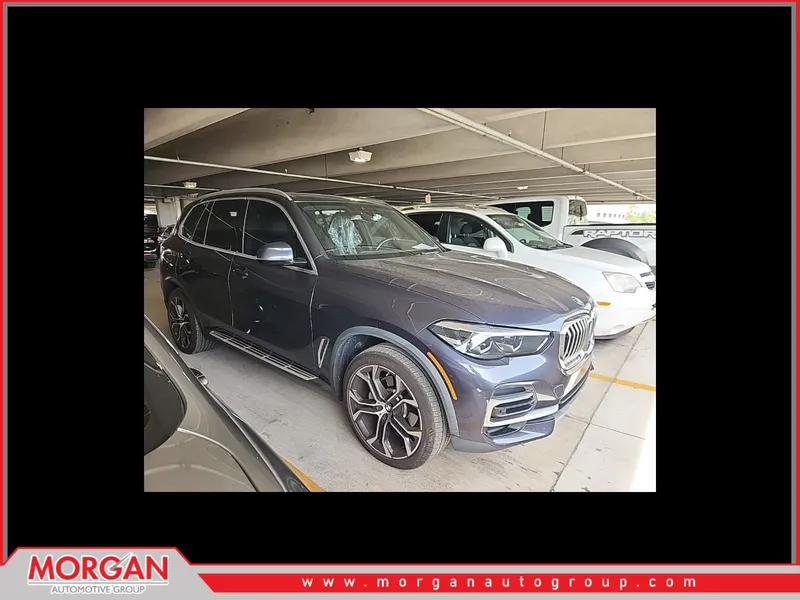 2022 BMW X5 xDrive40i in Arctic Grey Metallic — front three-quarter view