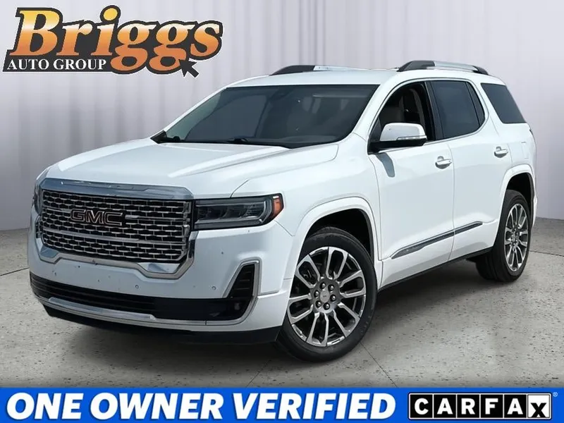 2023 GMC Acadia Denali in Summit White — front three-quarter view