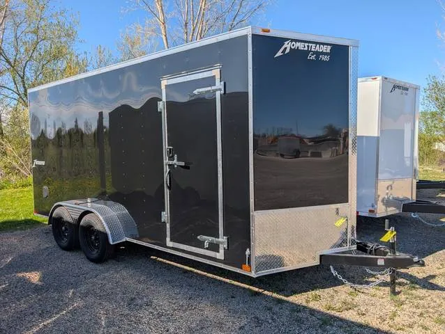 2026 Homesteader 7x16 TA, 7000 GVWR, 7' Interior, Small Dent Discount Unit — front three-quarter view