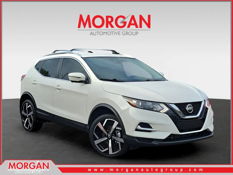 2022 Nissan Rogue Sport SL in White — front three-quarter view