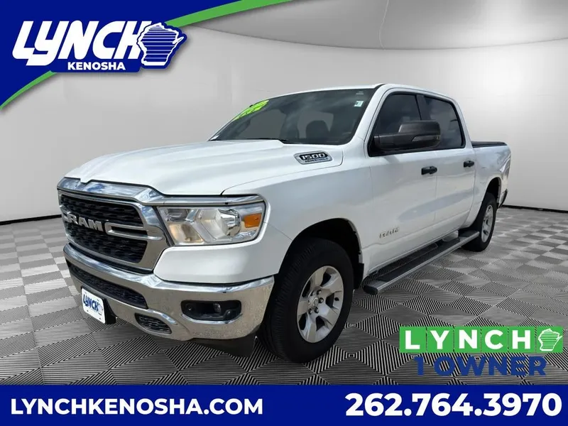 2023 RAM 1500 Big Horn in White — front three-quarter view