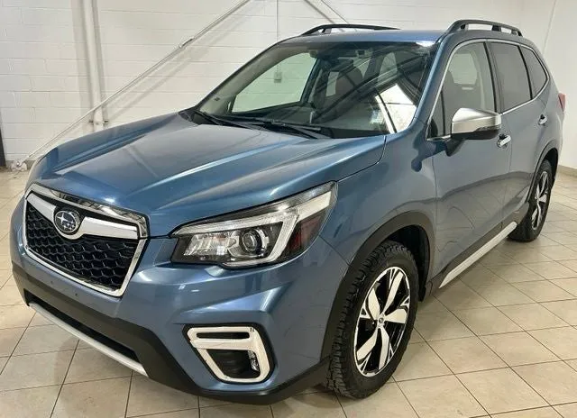 2019 Subaru Forester Touring in Horizon Blue Pearl — front three-quarter view