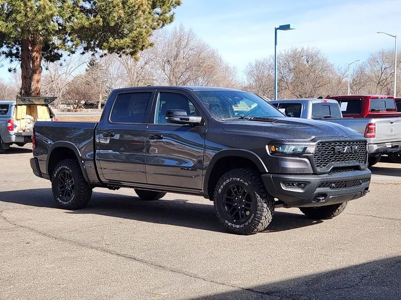 2026 RAM 1500 RAM 1500 REBEL CREW CAB 4X4 5'7' BOX in Granite Crystal Metallic Clear-Coat Exterior Paint — front three-quarter view